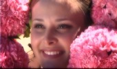 bride face surrounded by pink flowers at BeckenRidge Vineyard in Oregon, from wedding video sample clip by Focal Point Digital Media