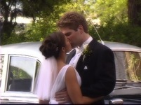 Focal Point Video: bride groom kiss near antique Bentley or Rolls-Royce in Portland, from wedding video clip